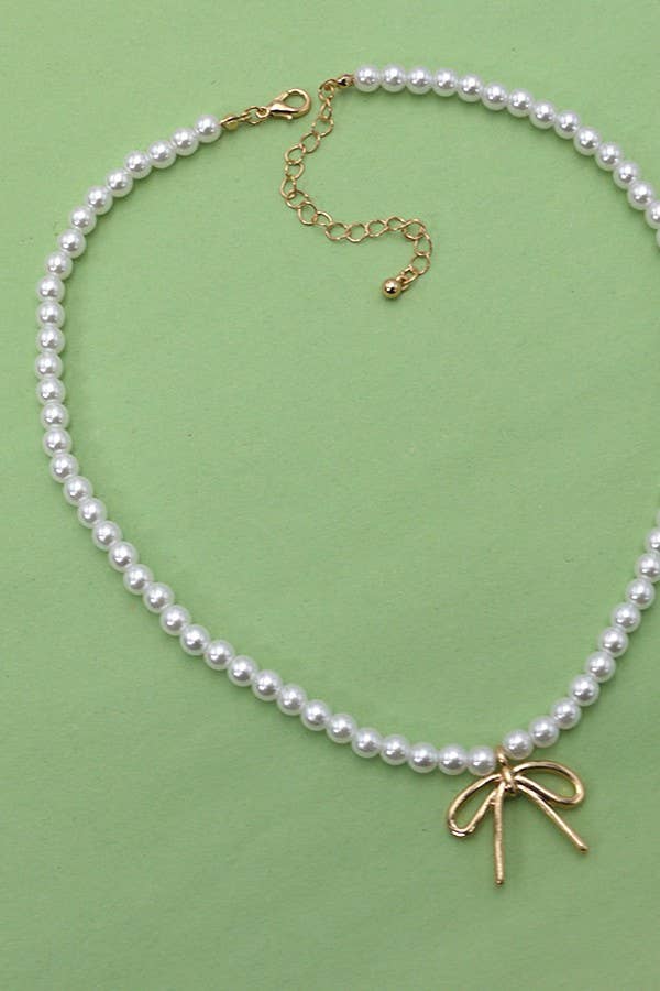 JOSSLYN by wall to wall - PEARL CHAIN BOW CHARM NECKLACE | 80N342