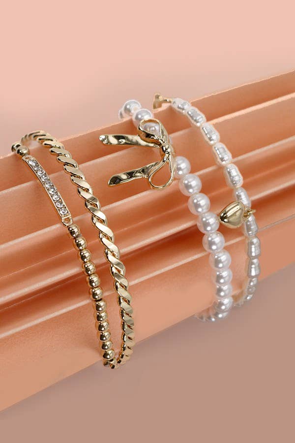JOSSLYN by wall to wall - BOW PEARL RHINESTONE BAR STRETCH BANGLE SET | 80B137