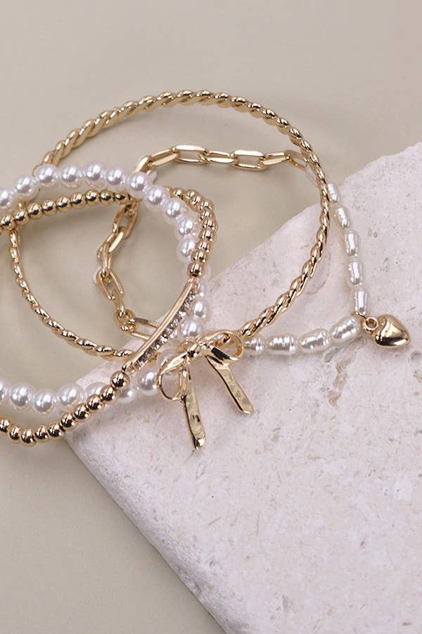 JOSSLYN by wall to wall - BOW PEARL RHINESTONE BAR STRETCH BANGLE SET | 80B137