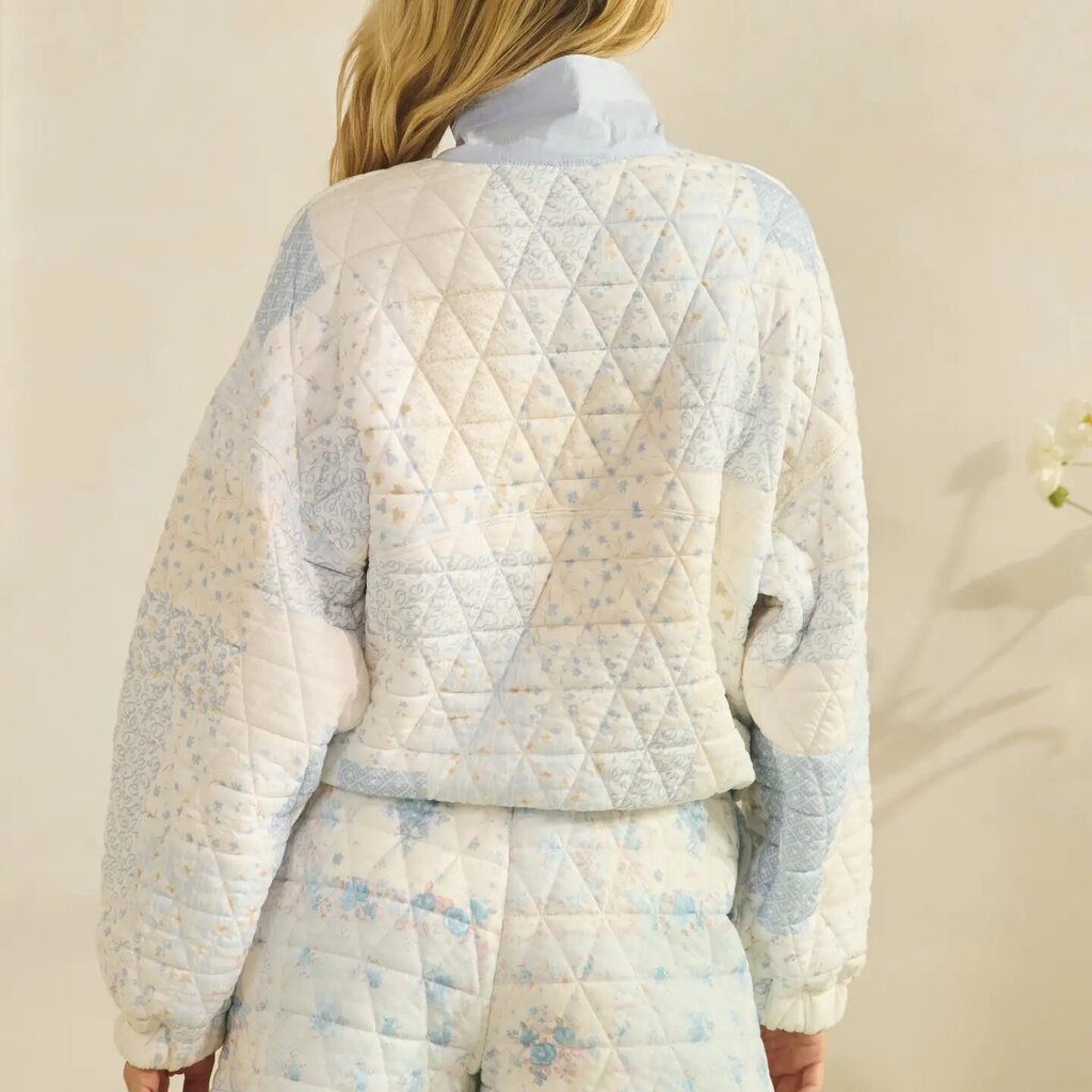 Long sleeve quarter snap quilted sweater