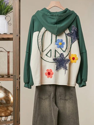 Green hoodie with wide cream stripes and cream sleeve panels, alternate view 2