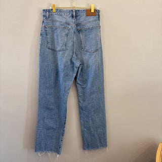 Raw hem jeans w/ distressing