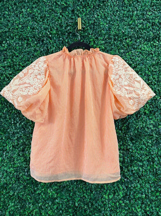 THML orange mock neck striped top, embroidery detail