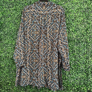 Long sleeve patterned sheer tunic length top