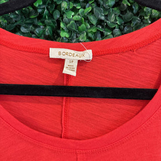 Solid bell sleeve top