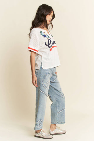 Davi & Dani plus size light denim straight fit stretch pants with peace patch graphic - The White Willow Boutique, Huntington WV